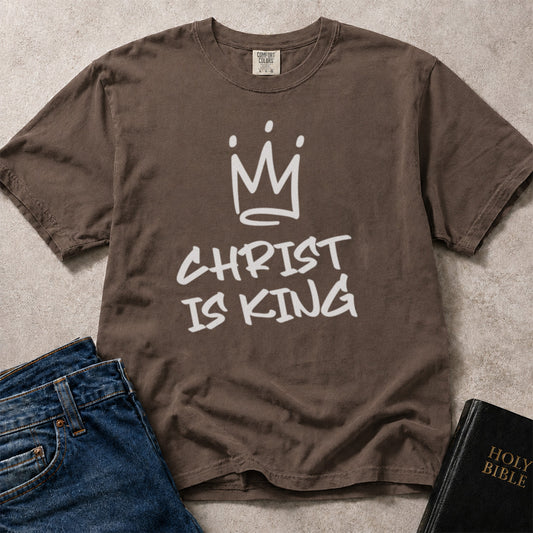 Brown Comfort Colors 1717 Christian t-shirt with 'Christ is King' text and crown graphic.