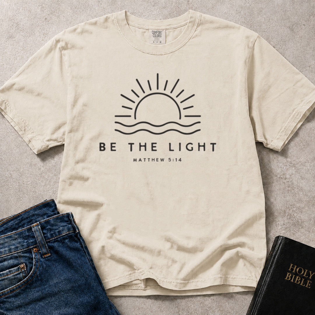 Off White (Ivory) Comfort Colors® 1717 scripture inspired tee featuring a Be the Light design drawn from Matthew 5:14.