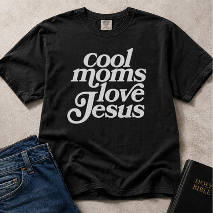 Black Comfort Colors® 1717 women’s t-shirt with typographic Christian text that reads Cool Moms Love Jesus.