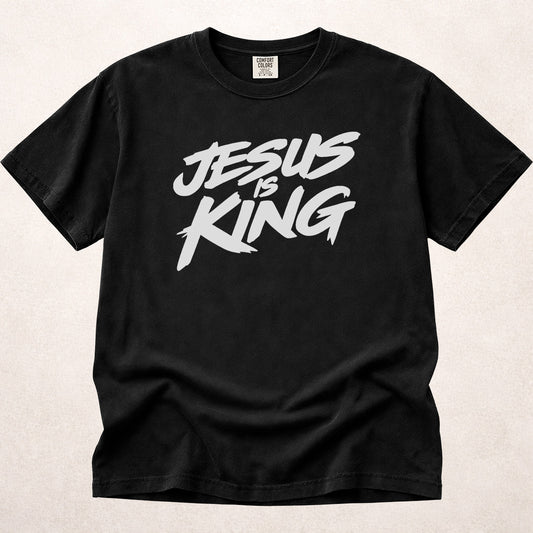 Black Comfort Colors® 1717 tee with Jesus Is King text in a streetwear graffiti style.