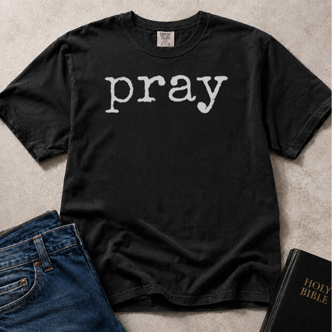 Pray Christian typography graphic on black Comfort Colors 1717® shirt.