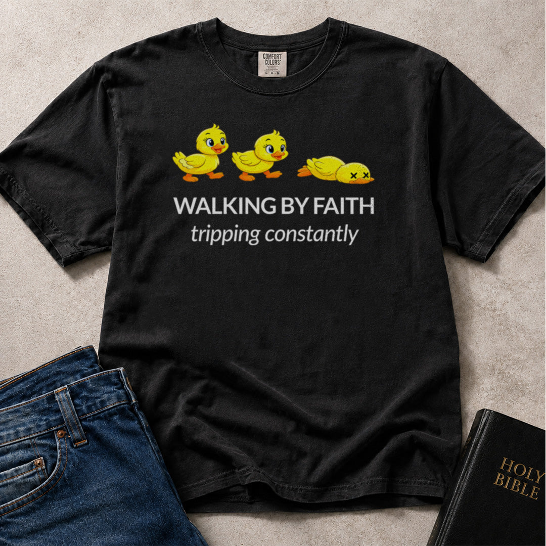 Walking By Faith Tripping Constantly Bible verse graphic on black Comfort Colors 1717® t-shirt.