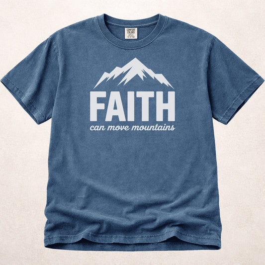 Blue faith t-shirt with 'FAITH can move mountains' text and mountain graphic on Comfort Colors 1717 blue jean tee.