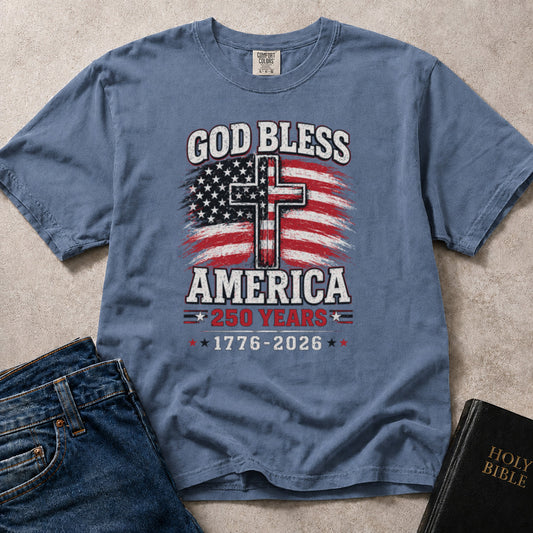 Patriotic Christian t-shirt featuring an American flag, a cross, and God Bless America - 1776 - 2026, 250 years.