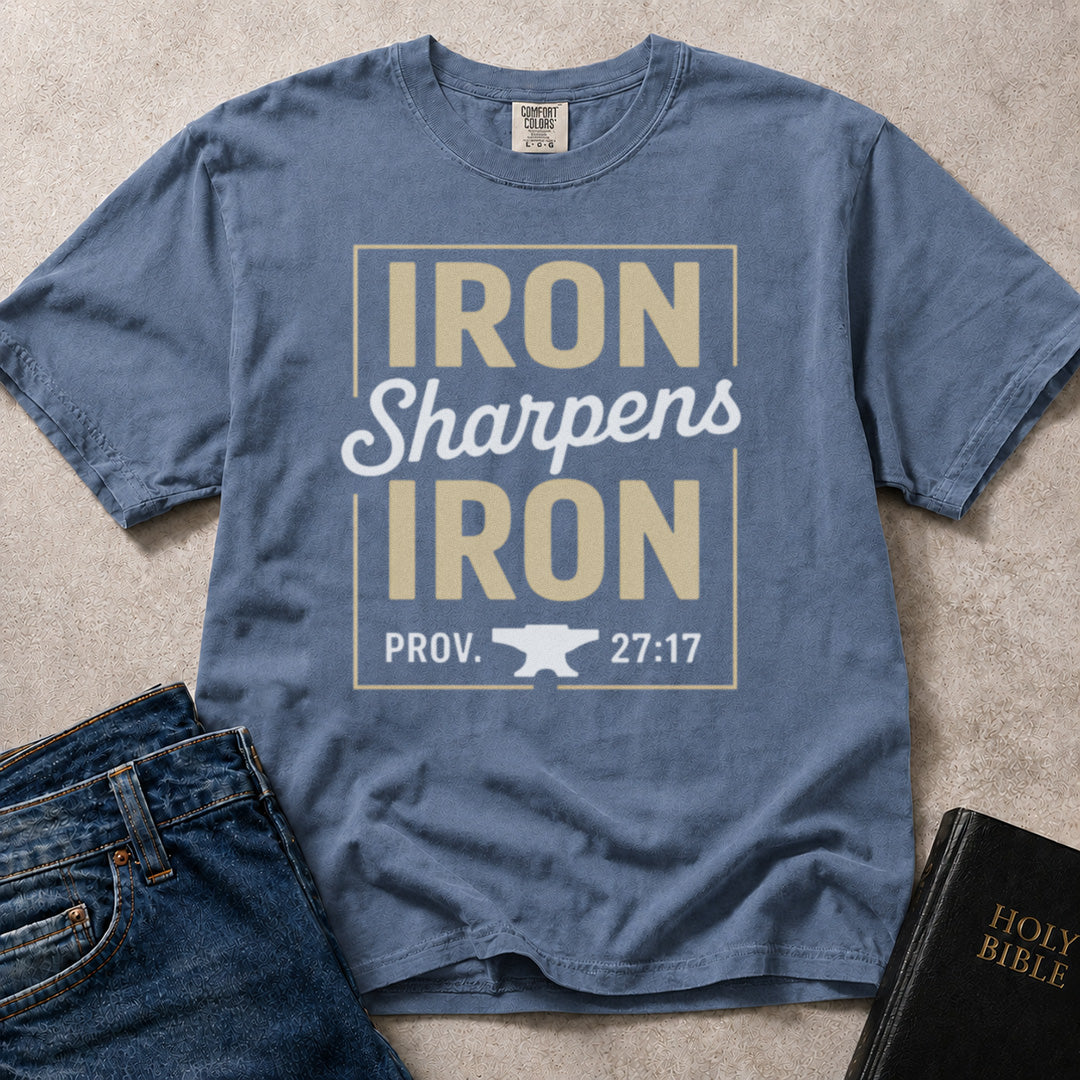 Blue (Blue Jean) Comfort Colors® 1717 t-shirt featuring Iron Sharpens Iron wording with an anvil and Proverbs. 27:17 reference.