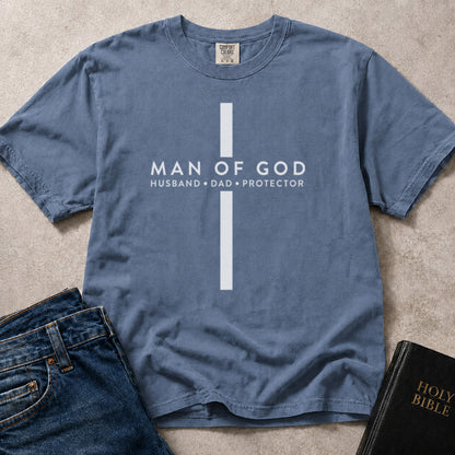 Blue (Blue Jean) Comfort Colors® 1717 Christian tshirt showcasing strong typography with the words Man of God Husband Dad Protector.