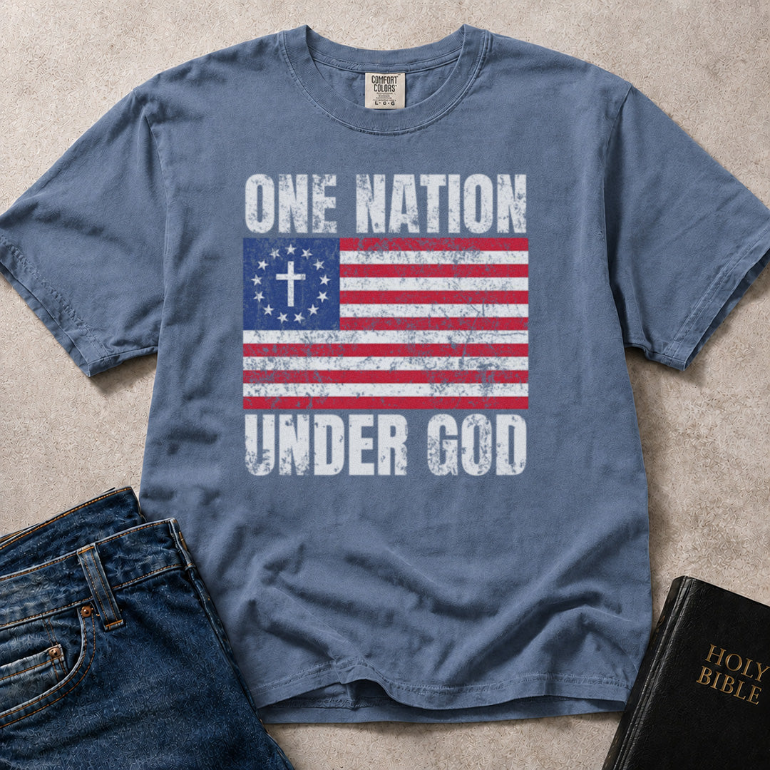 Patriotic Christian t-shirt with 'One Nation Under God' American flag graphic on a Comfort Colors 1717 tee in Blue Jean. 
