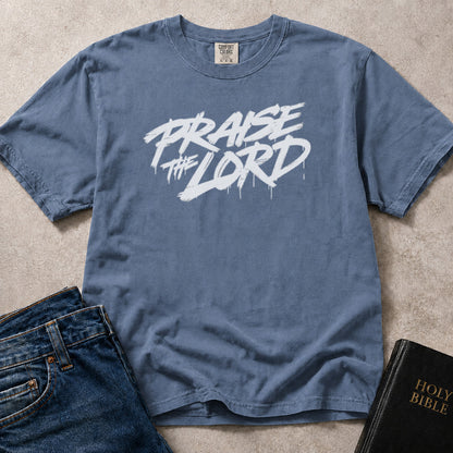 Praise the Lord Christian typography graphic on a blue (Blue Jean) Comfort Colors 1717® shirt.