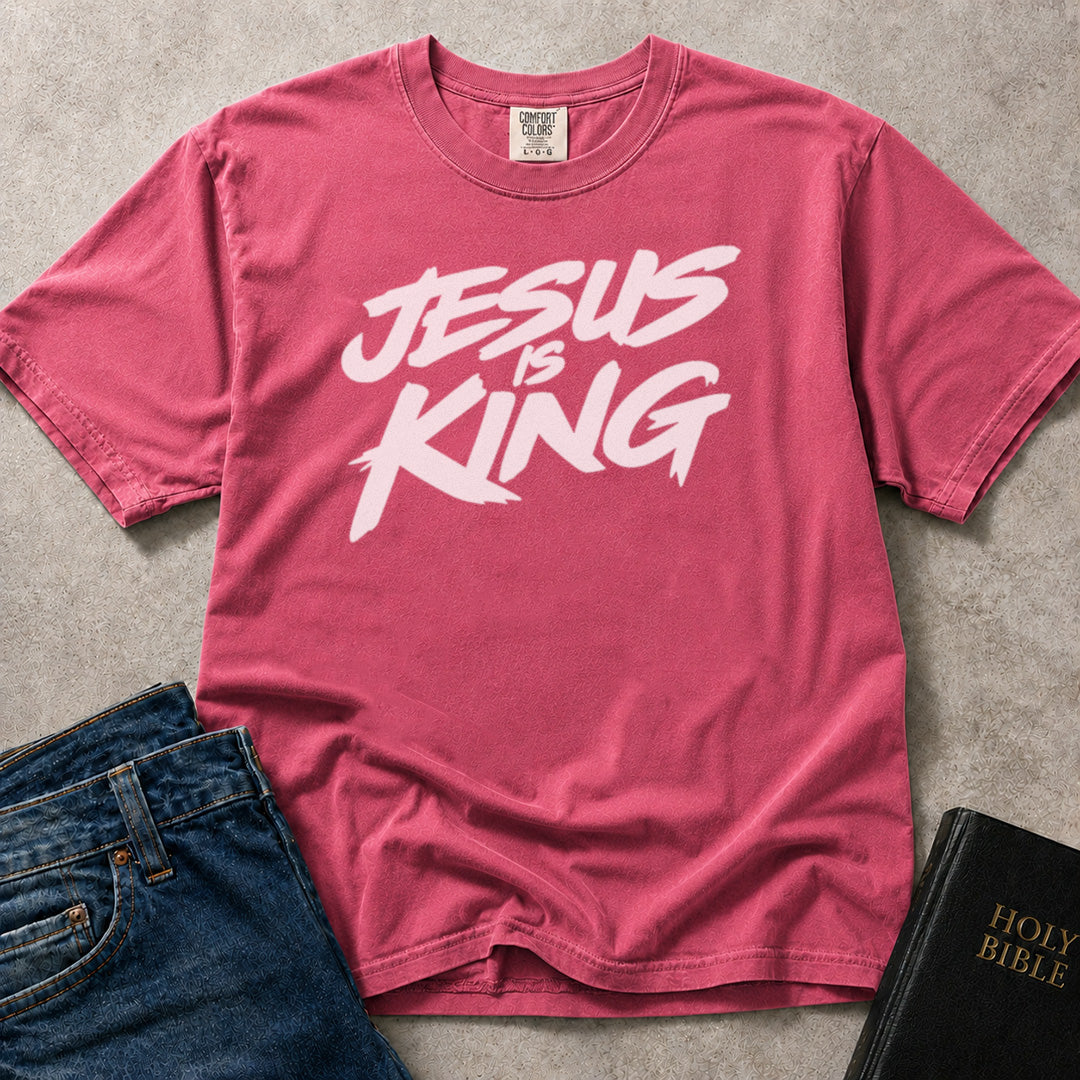 Pink (Crunchberry) Comfort Colors® 1717 t-shirt with Jesus Is King text in a streetwear inspired graphic style.