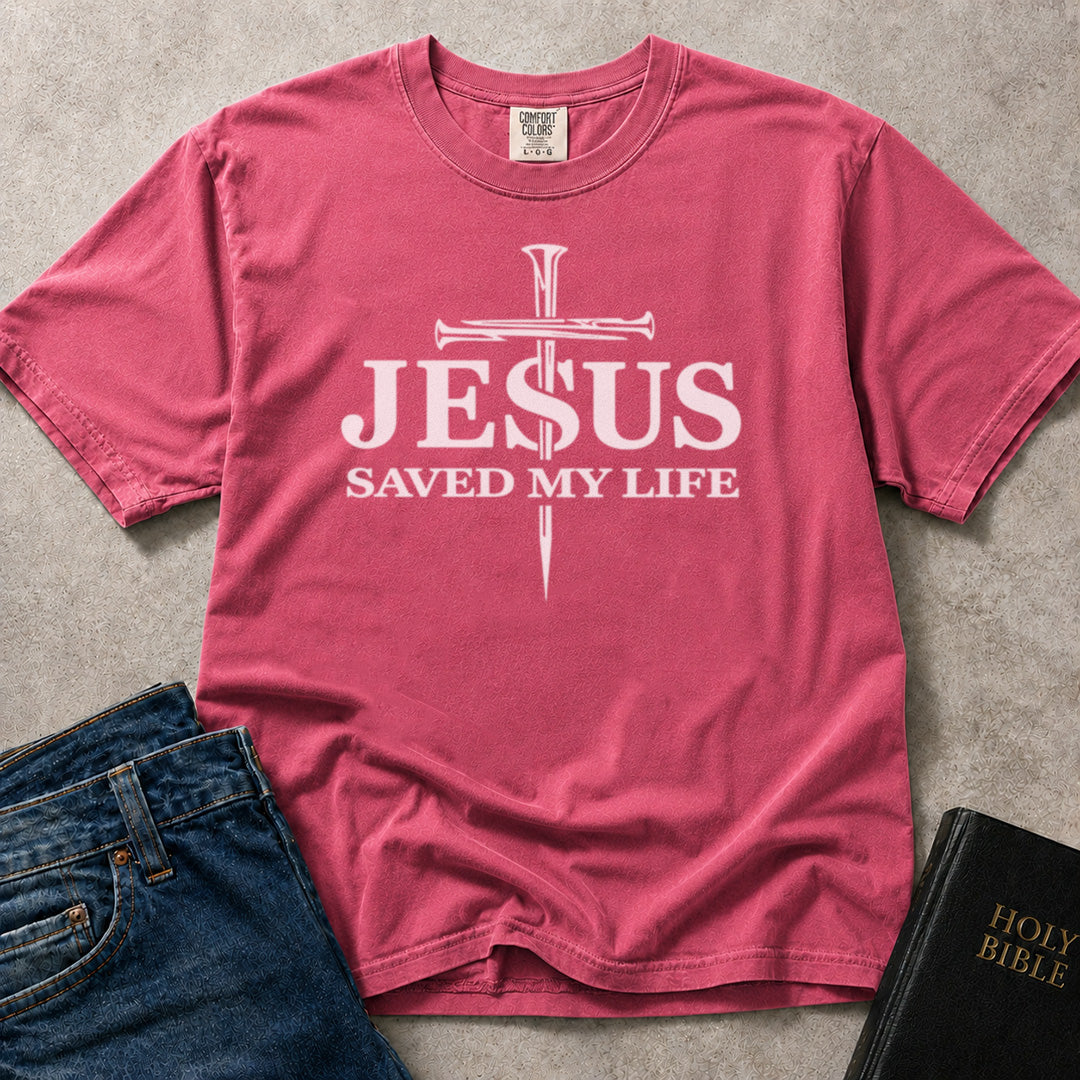Pink (Crunchberry) Comfort Colors® 1717 t-shirt featuring Jesus Saved My Life cross artwork with a faith inspired message.