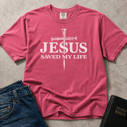 Pink (Crunchberry) Comfort Colors® 1717 t-shirt featuring Jesus Saved My Life cross artwork with a faith inspired message.