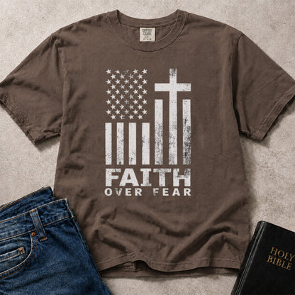 Espresso brown Comfort Colors 1717 patriotic Christian t-shirt with American flag and cross design, featuring 'Faith Over Fear' text.
