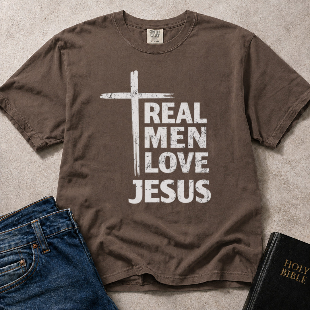 Real Men Love Jesus religious slogan with a cross design on brown (Espresso) Comfort Colors 1717® t-shirt.