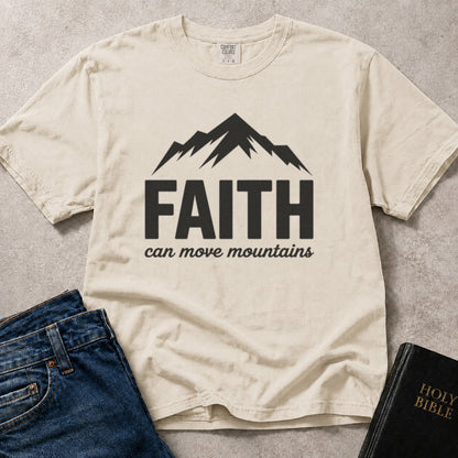 Beige faith t-shirt with 'FAITH can move mountains' text and mountain graphic on Comfort Colors 1717 ivory tee.