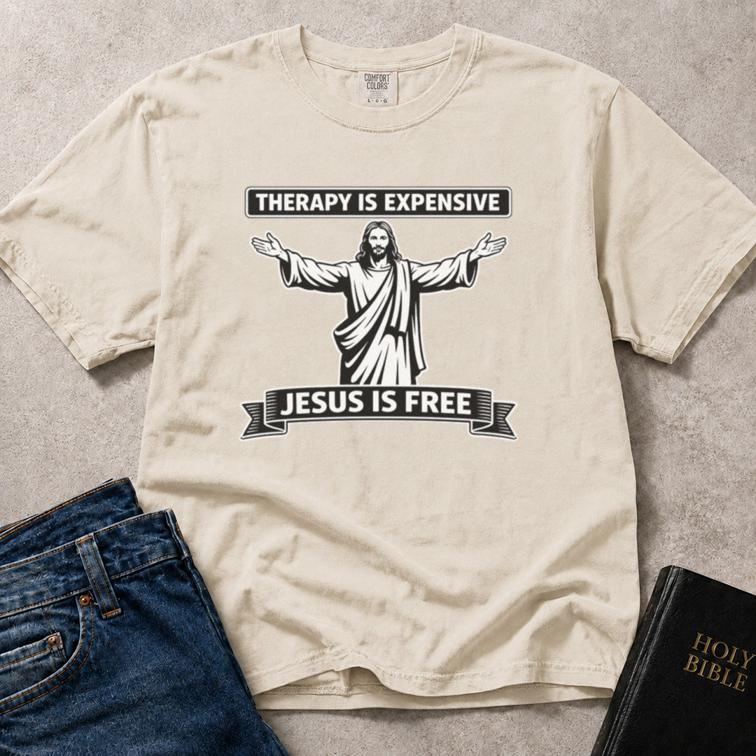Therapy is Expensive, Jesus is Free faith based graphic on beige (Ivory) Comfort Colors 1717® t-shirt.