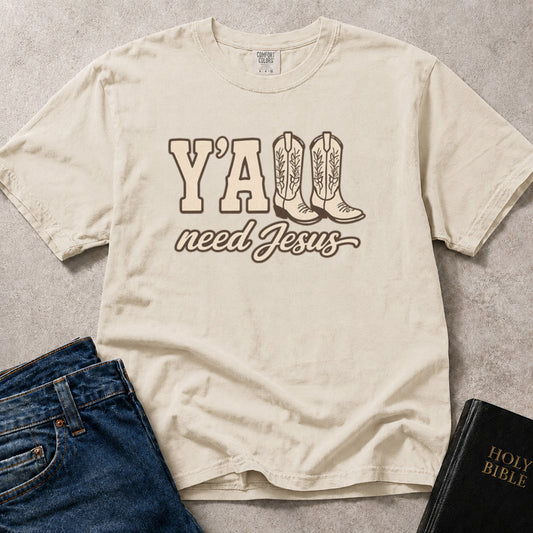 Off White (Ivory) Comfort Colors® 1717 t-shirt featuring a faith-based Y'all Need Jesus Southern graphic design with cowboy boots.
