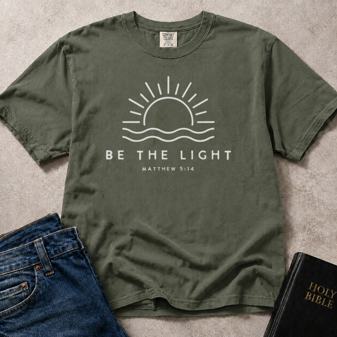 Green (Moss) Comfort Colors® 1717 uplifting faith inspired t-shirt featuring Be the Light artwork rooted in Matthew 5:14.