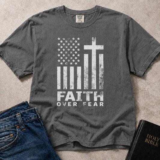 Pepper Comfort Colors 1717 patriotic Christian t-shirt with American flag and cross design, featuring 'Faith Over Fear' text.