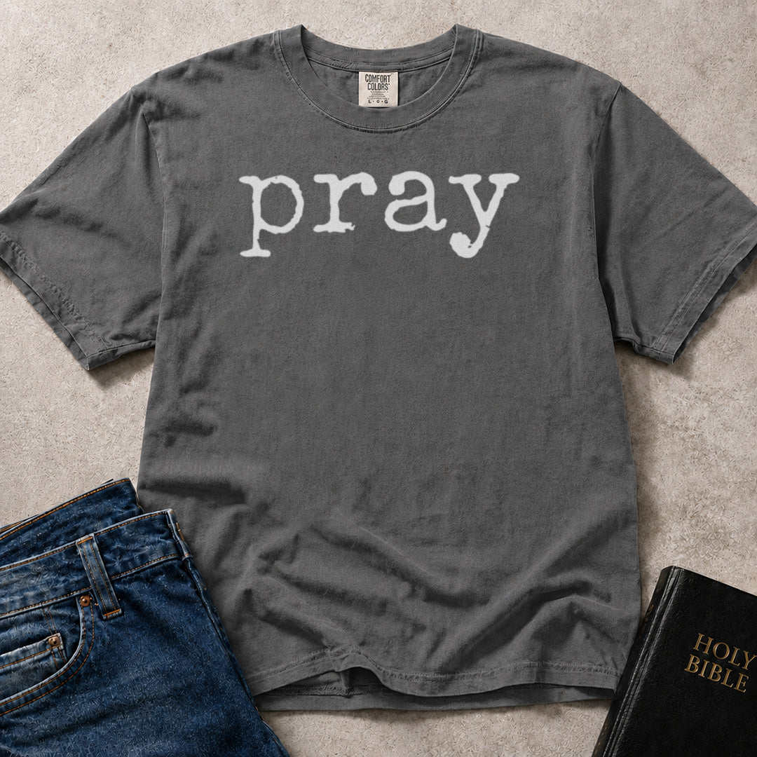 Pray devotional message print on faded black (Pepper) Comfort Colors 1717® t-shirt.